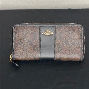 Coach brown and black accordion zip wallet